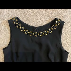 Black DKNY Formal Dress, Size 2, with brass & black beaded collar.